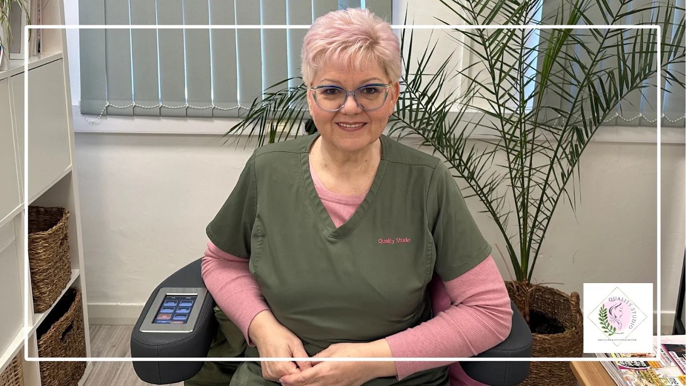 Suzy, founder of Quality Studio and Academy, seated in her Derby treatment studio